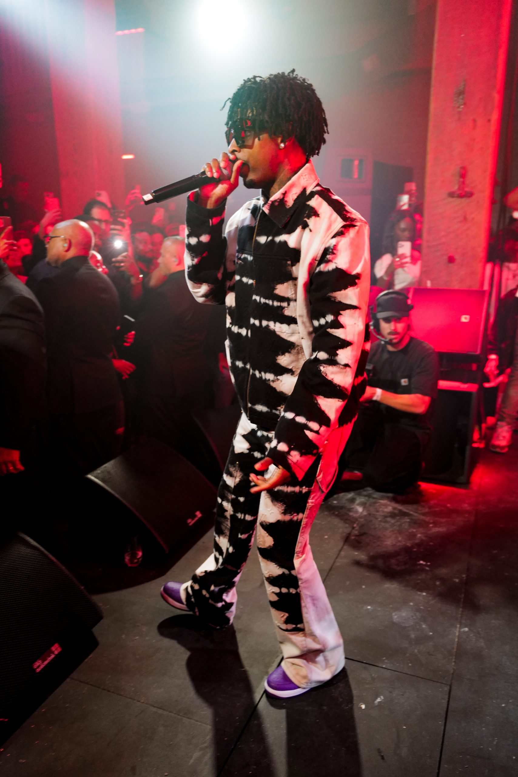 Louis Vuitton Celebrates Exhibition Opening With 21 Savage Performance – WWD