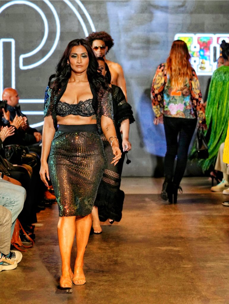 Fatima Ali on the runway wearing two-piece skirt set by Carlos Zanetta at Los Angeles Fashion Week 2024 - Photo Credit Paradigm Photography - All Rights Reserved